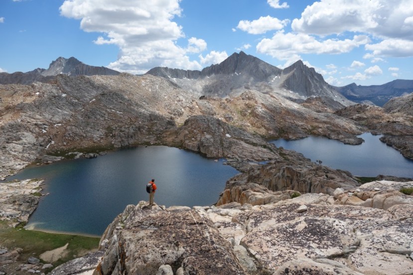 Charlie looking down at Bear Lake and Ursa Lake. Seven Gables and Gemini are in the background.  